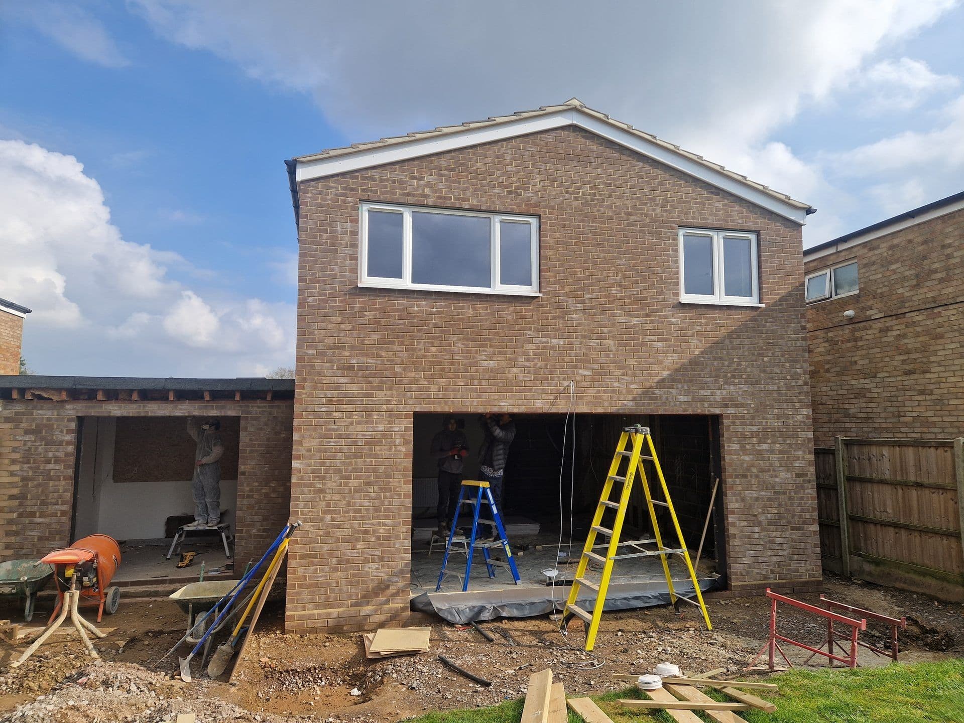 Brickwork and new windows on a two storey home extension being built by DNR Build
